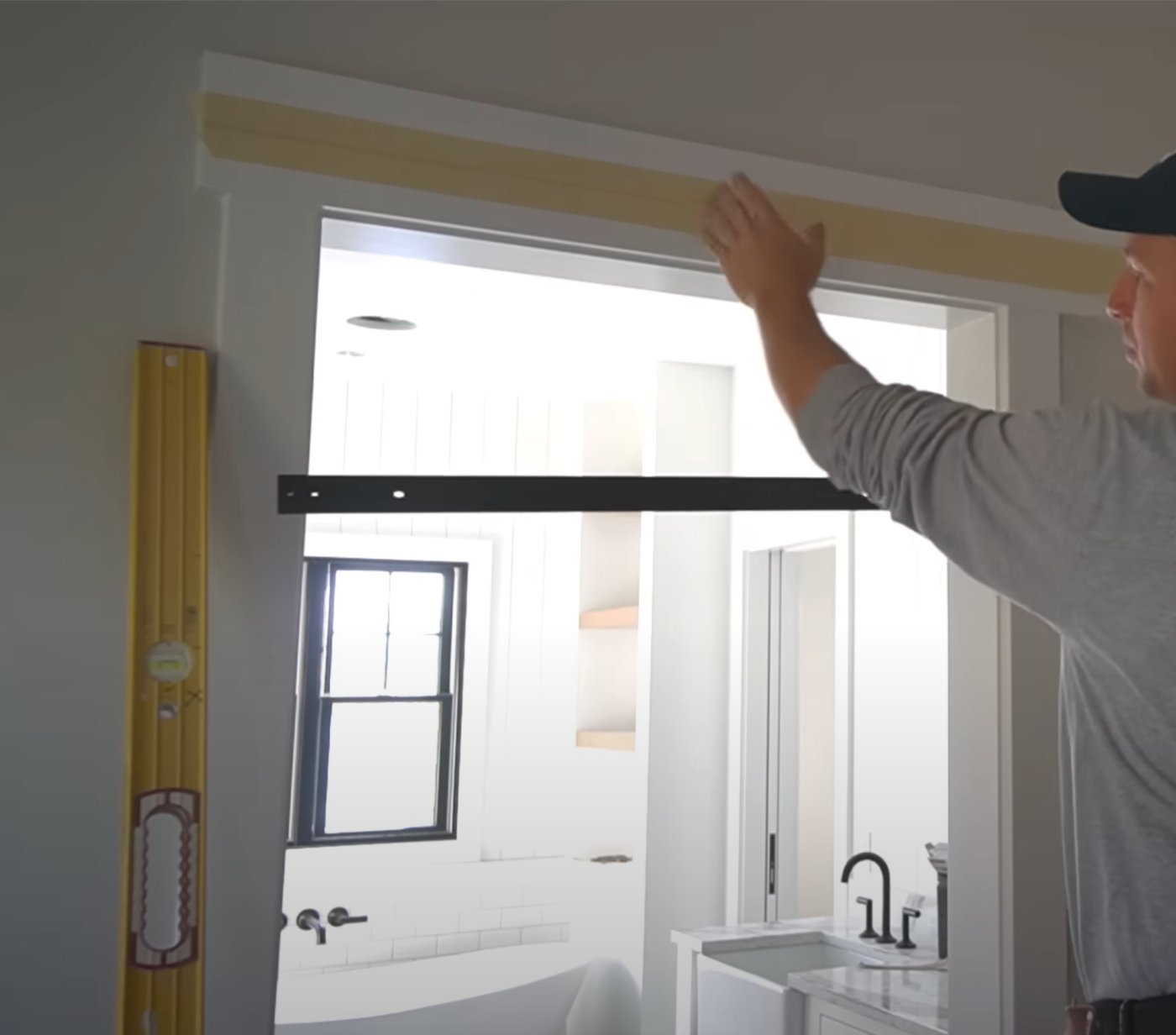 Sebastians Sliding Door Repair technician installing a sliding door track in Laguna Niguel